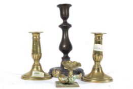 A pair of 19th century candlesticks toge