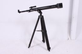 A Tasco telescope, late 20th century com