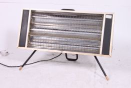 A retro electric fire by Falks standing