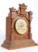A Victorian oak cased Ansonia gingerbrea