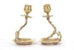 A pair of 19th century brass candlestick