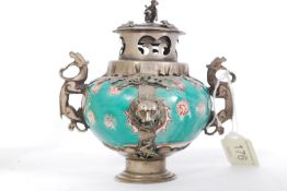 A Chinese white metal and ceramic incens