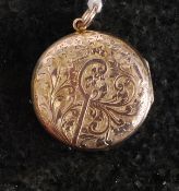 A believed 9ct (marks obscured) gold pen