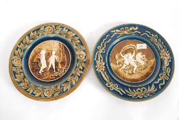 Two Austrian Delft wall chargers bearing