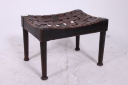 An oak leather weave foot stool. Measure