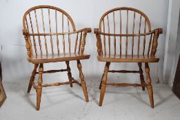 A pair of Smokers bow / Windsor armchair