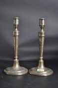 A large pair of silver hallmarked candle