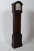 A 1930's oak cased granddaughter clock h