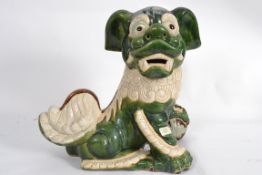 A large Chinese china fu-dog garden orna