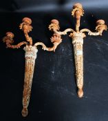 A pair of early - mid 20th century cast