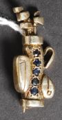 An 18ct gold and sapphire brooch in the
