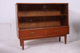 A retro 1960's teak bookcase cabinet rai
