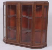 A 1930's oak leaded and stained glass di