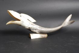 A 20th century large carved horn in the