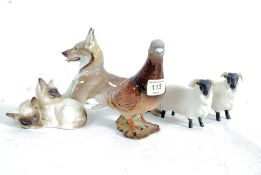 A collection of mixed china figurines to