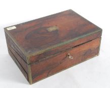 A Georgian 19th century rosewood and bra