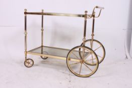 A retro style brass and glass retro butl