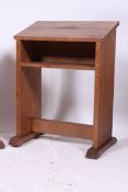 A pair of 20th century oak lecterns havi