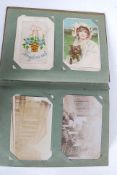 Postcards; An old Edwardian postcard alb