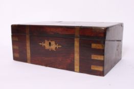A Victorian mahogany writing slope havin