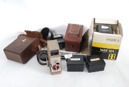 A collection of vintage camera parts and