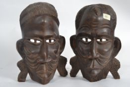A pair of decorative African tribal mask