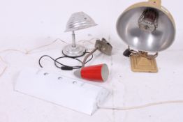 A clip on retro anglepoise desk lamp wit