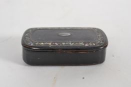 An early 20th century ebony snuff box wi