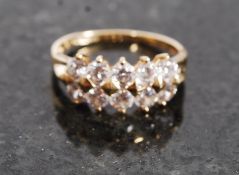 A 14ct gold ladies dress ring having ins