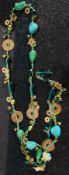 A Chinese malachite and turquoise string