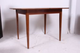 A 1950's walnut retro draw leaf refector