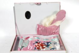 A fabulous 1960's cased oriental silk dr