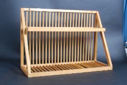 A Habitat style pine hanging wall rack o
