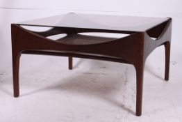 A retro 1970's Danish teak and rattan we