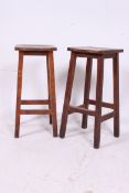 A pair of vintage industrial oak work st