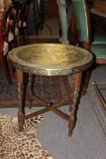 A 1920's oak barleytwist and brass toppe