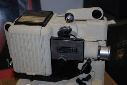 A vintage Eumig 8mm film projector with