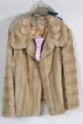 A ladies 1950's vintage short fur coat h