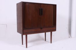 A retro 1950's teak wood tambour fronted