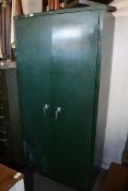 A large 1950's green Industrial metal st