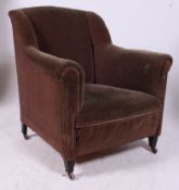 An Edwardian mahogany chesterfield armch