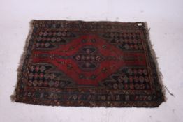 A late 19th century Baluch hand woven ru