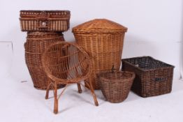 A collection of whicker baskets  togethe