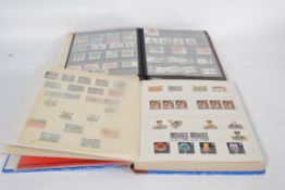 Two albums of mostly unused decimal stam