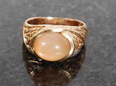An 18ct gold large ring with inset frost