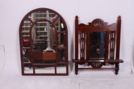 A Victorian style mahogany wall mirror w