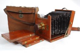 A Victorian mahogany cased plate camera
