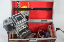 An excellent leather cased vintage Penta