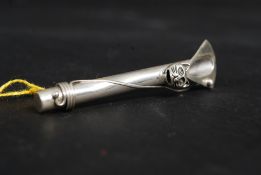 A white metal / silver posy holder brooc