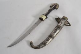 A 20th century white metal and brass dec